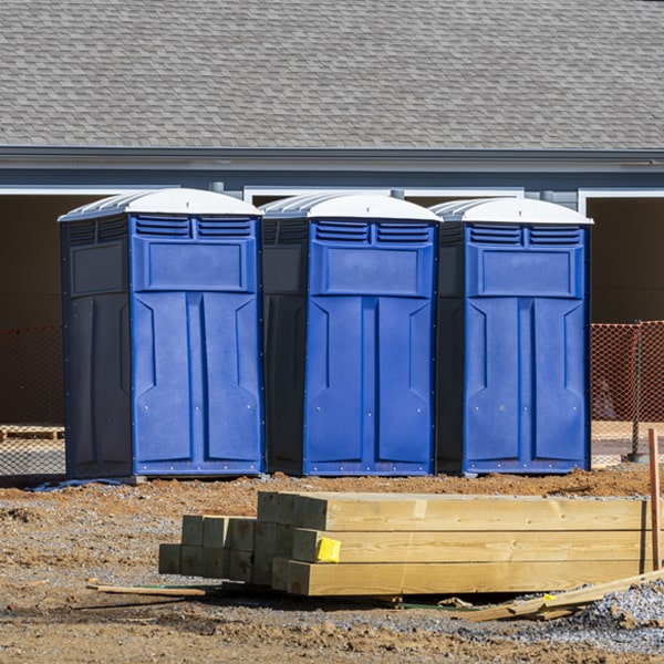 how often are the portable restrooms cleaned and serviced during a rental period in Bay